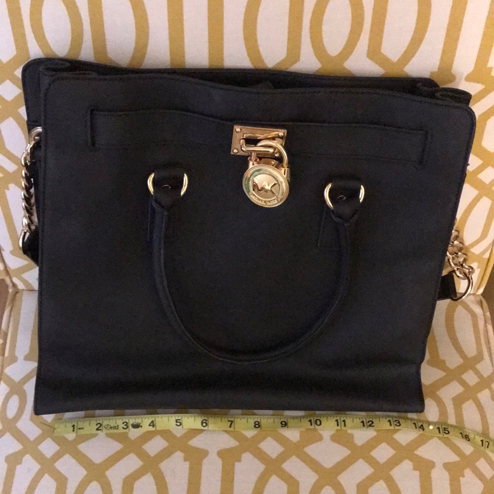 Michael Kors Black and Gold Satchel with Structured Design
